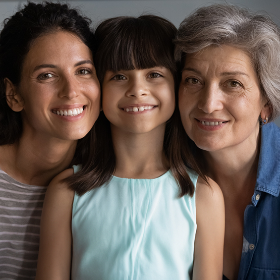 Mother daughter and grandmother smiling together